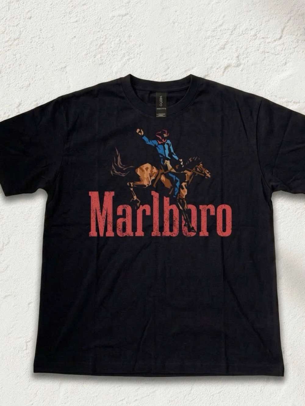 Marlboro Black Tee with Rodeo Rider Graphic and Red Logo